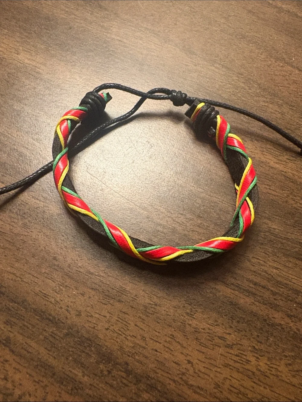 Black Braided Leather Bracelet with Red, Yellow & Green Accents